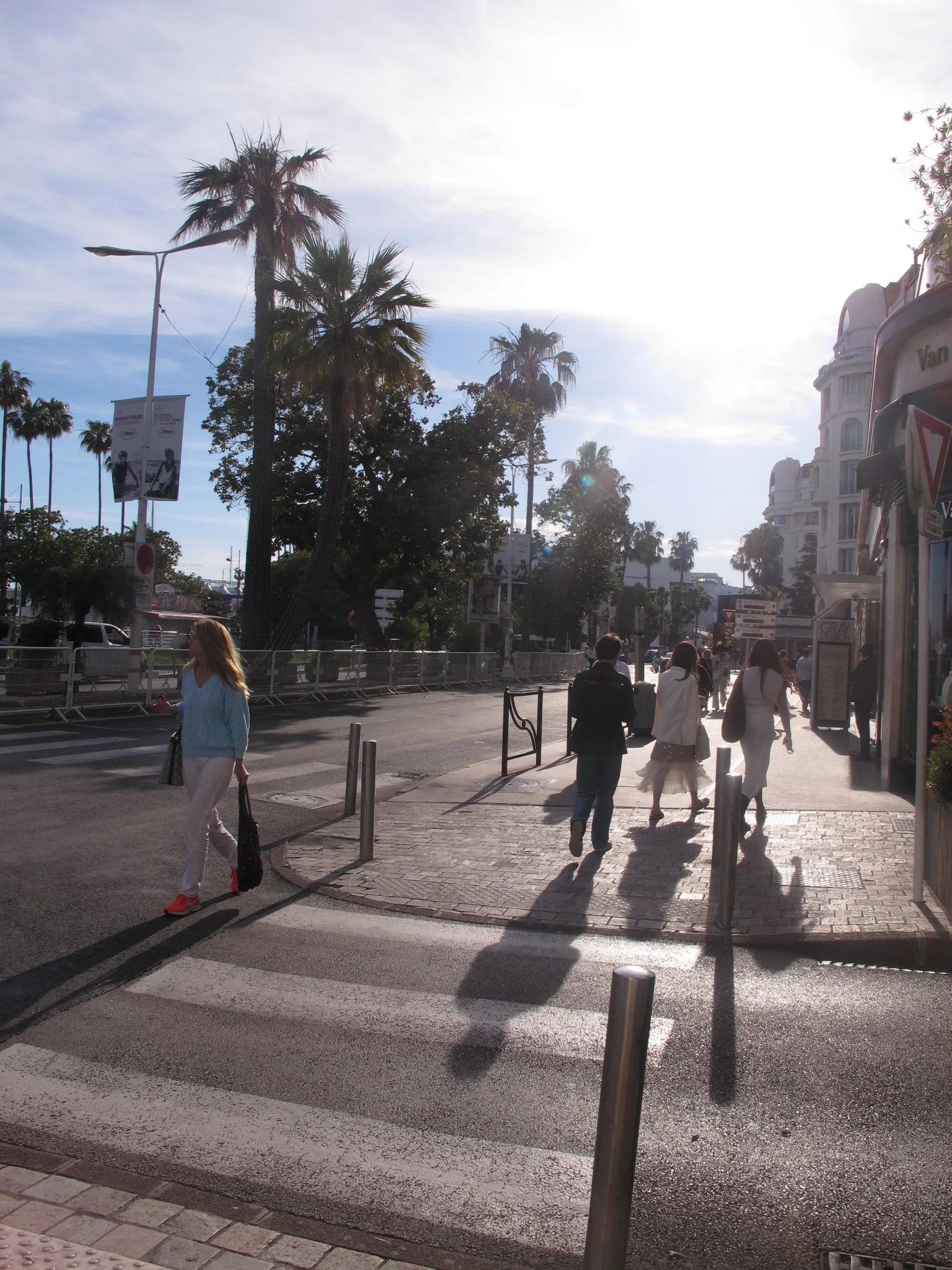 Sunlit street scene in Cannes